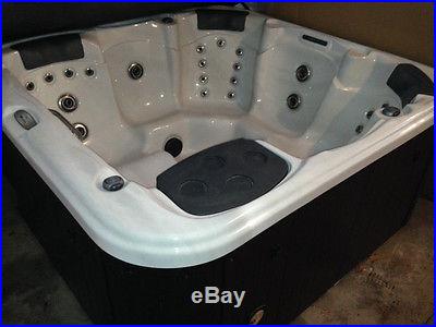 6 person hot tub 4 months young, moving and can't take with