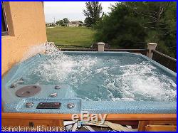 8 PERSON HOT TUB WITH WATERFALL AND MULTICOLOR LIGHTS 2 YEARS OLD $6700 MSRP