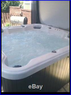 Balboa Hot Tub Jacuzzi with steps and insulated cover
