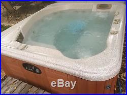 Hot Spring Highlife 4-person Portable Spa. Good working order LOCAL PICKUP ONLY