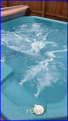 Hot tub blue water spa by jacuzzi