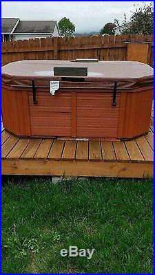 Hot tub blue water spa by jacuzzi
