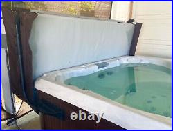 Hot tub spa jacuzzi J-245 excellent condition less than one year old barely used