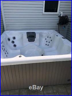 Luxurious Outdoor Spa/Hot Tub with lights and a waterfall. 94 x 94 x 36