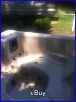 USED 5-6 PERSON HOT TUB WITH LOUNGE