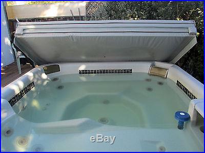 Used Hot Tub-506 person Dimension One. New parts, and cover and lifter