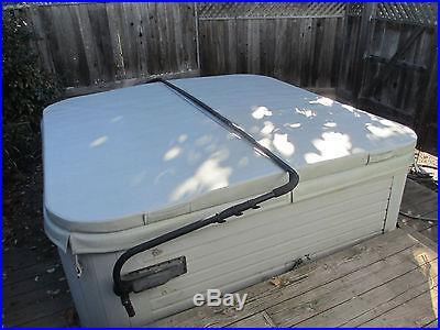 Used Hot Tub-506 person Dimension One. New parts, and cover and lifter